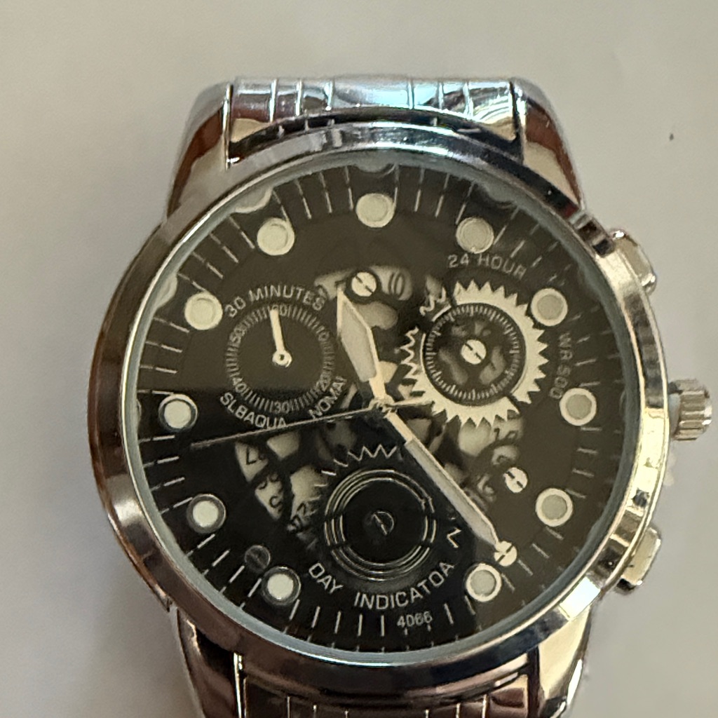 #24 Obsyss Silver And Black Skeleton Watch